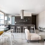 Elegant modern apartment with open kitchen and stylish decor